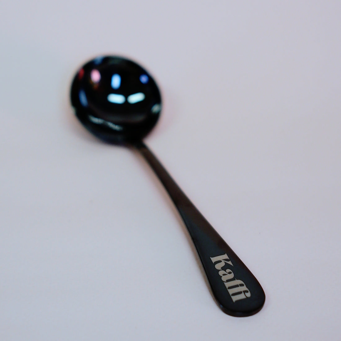 Cupping spoon